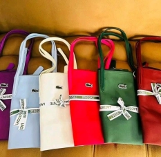 Sac Lacoste + Porte-monnaie à Bouaké – 6000 F